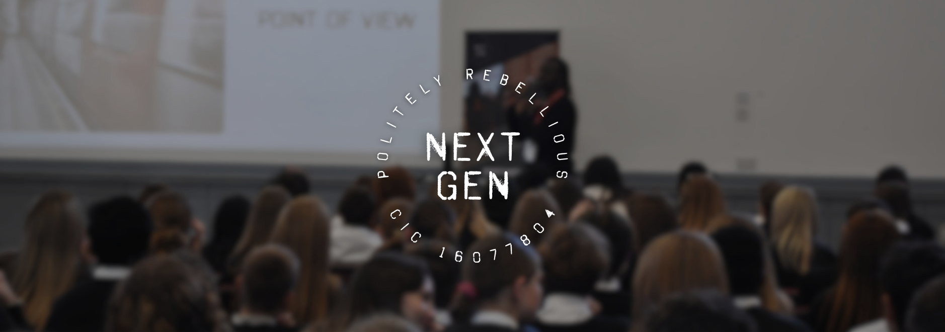 Audience in a school assembly setting with 'Next Gen' text overlay. Portsmouth, Hampshire.